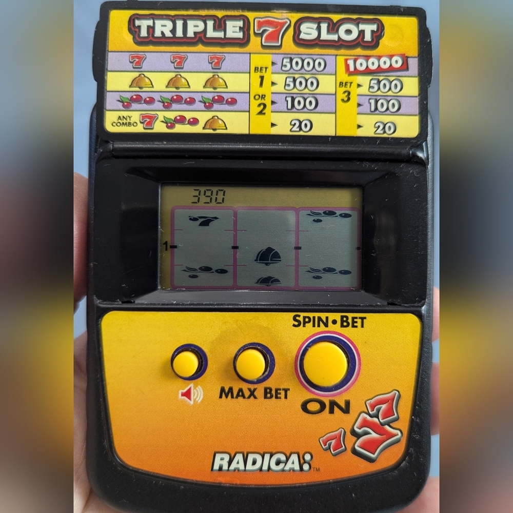 Radica Triple 7 Slot Flip-Top Model 2872, used - tested and working